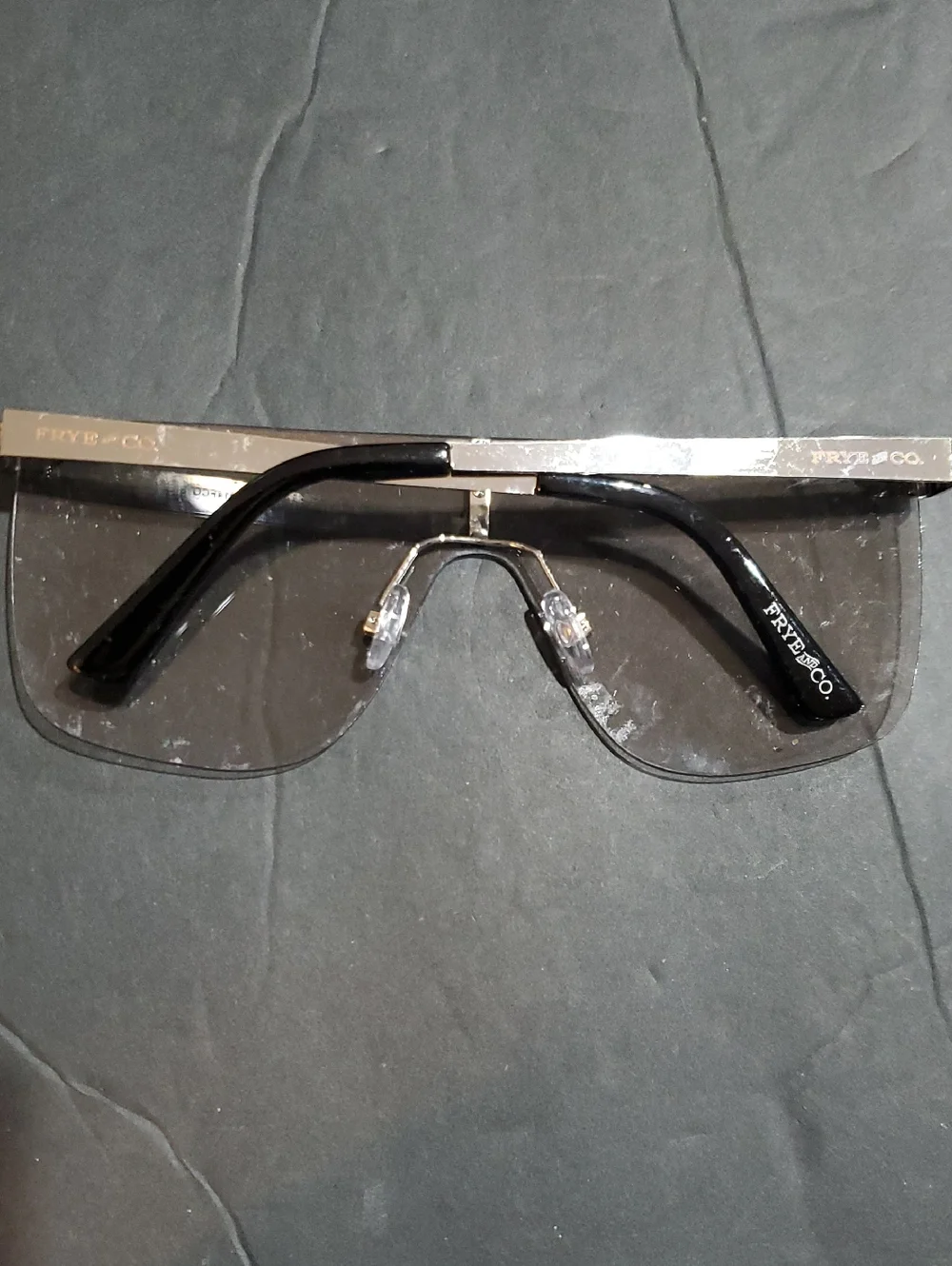 Frye silver flatbrow rimless frame oversized clear lenses square sunglasses